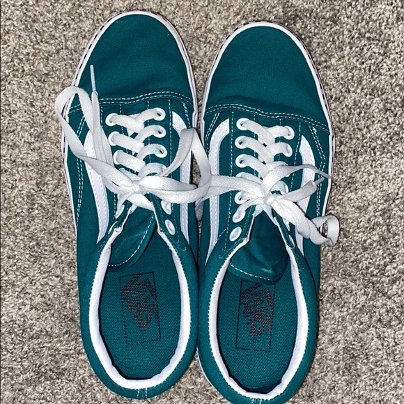 teal colored vans